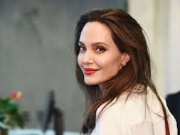 Angelina Jolie (/dÊ’oÊŠËˆliË/ joh-LEE; born Angelina Jolie Voight, June 4, 1975)[1] is an American actress, filmmaker, and humanitarian. She has received an Academy Award, two Screen Actors Guild Awards, and three Golden Globe Awards, and has been cited as Hollywood's highest-paid actress. Jolie made her screen debut as a child alongside her father, Jon Voight, in Lookin' to Get Out (1982). Her film career began in earnest a decade later with the low-budget production Cyborg 2 (1993), followed by her first leading role in a major film, Hackers (1995). She starred in the critically acclaimed biographical cable films George Wallace (1997) and Gia (1998), and won an Academy Award for Best Supporting Actress for her performance in the drama Girl, Interrupted (1999).https://en.wikipedia.org/wiki/Angelina_Jolie